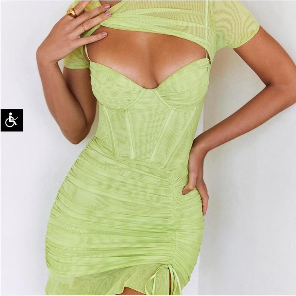 Mistress rocks corset green dress